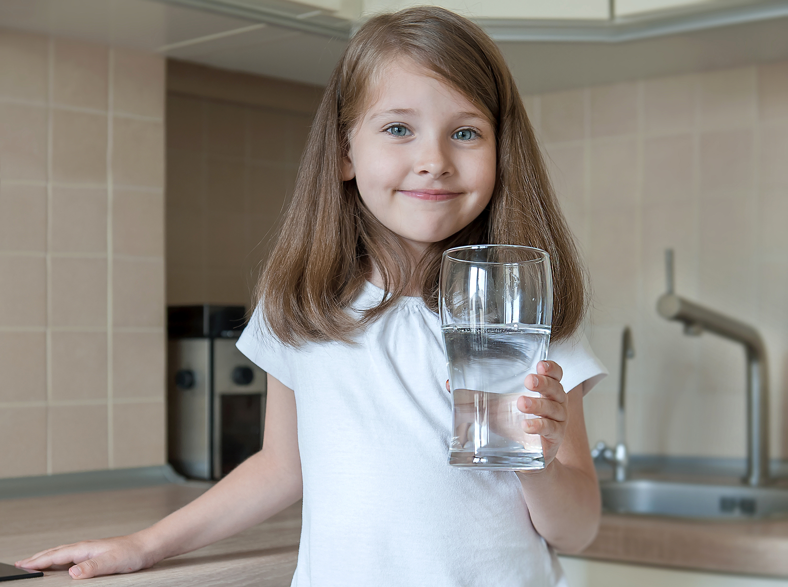 child drinking lead contaminated water