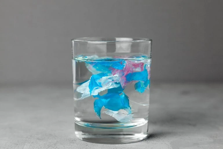 micro plastic in glass of ater