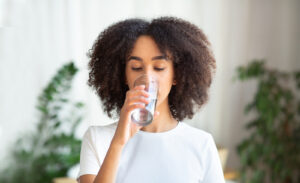 girl drinking carbonated water