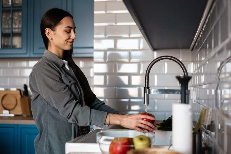 Washing Food In Kitchen