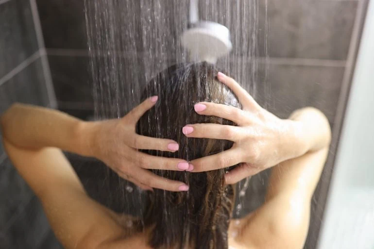 woman showering water pressure