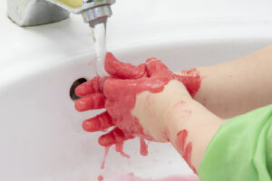 washing paint off hands
