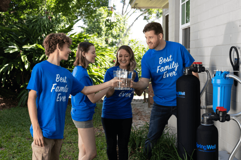 Family drinking clean filtered water