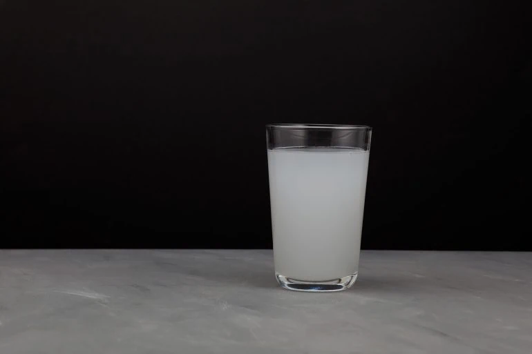 Milky Drinking Water in Glass