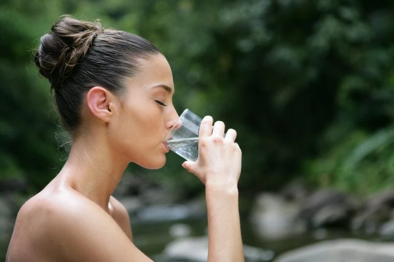 girl drinking hydrogen water