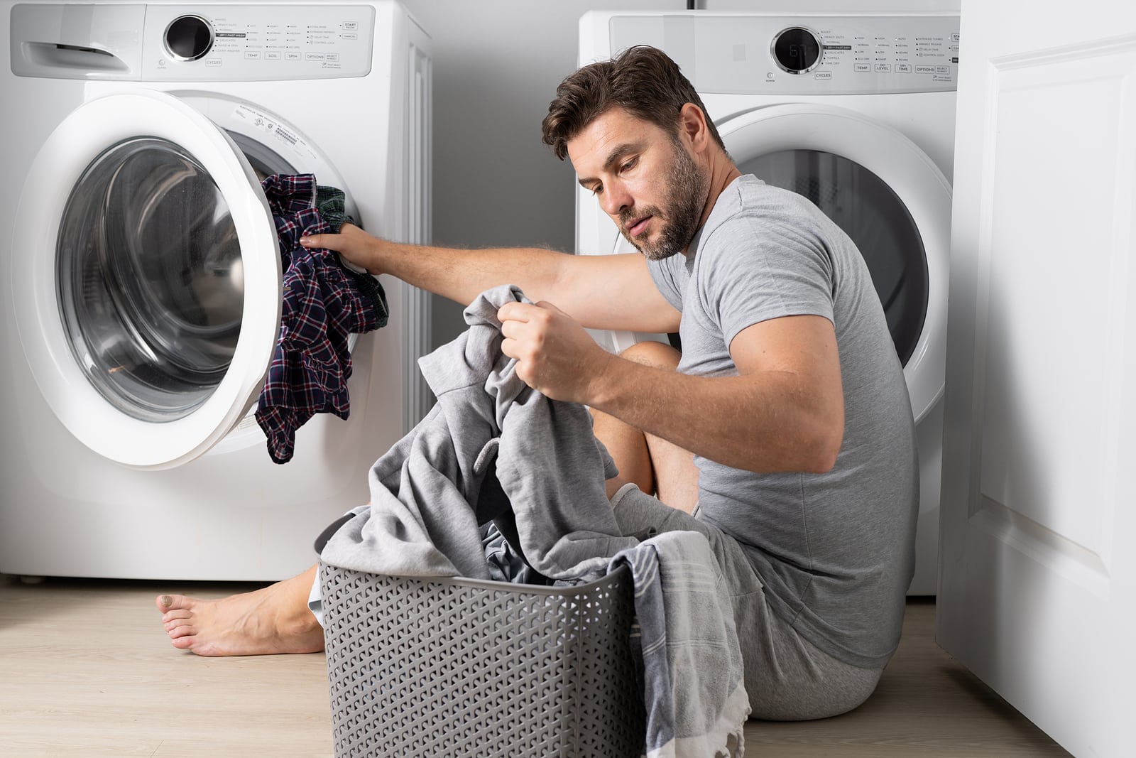 man doing laundry